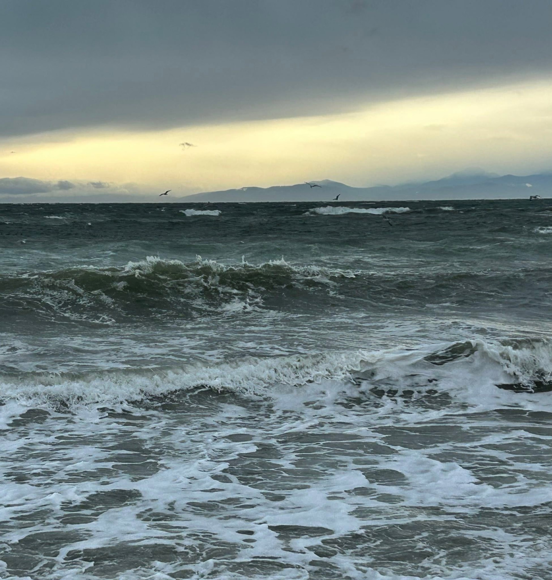 Waves under a dramatic sky on the Colwood coast